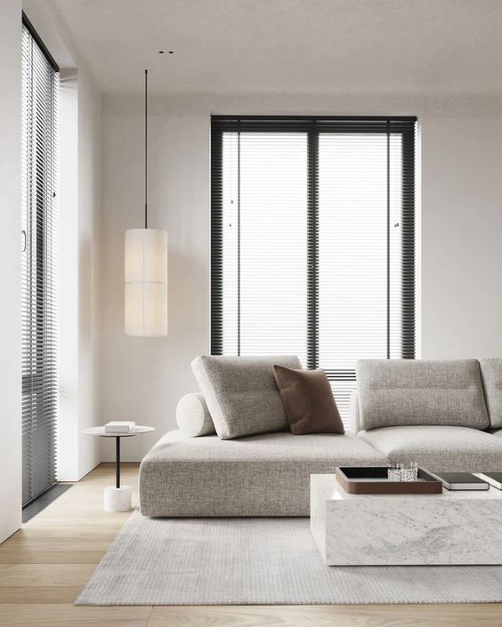 LỢI ÍCH CỦA TỐI GIẢN THIẾT KẾ NỘI THẤT TRONG CUỘC SỐNG 2 Hình ảnh phòng khách tối giản đẹp mắt